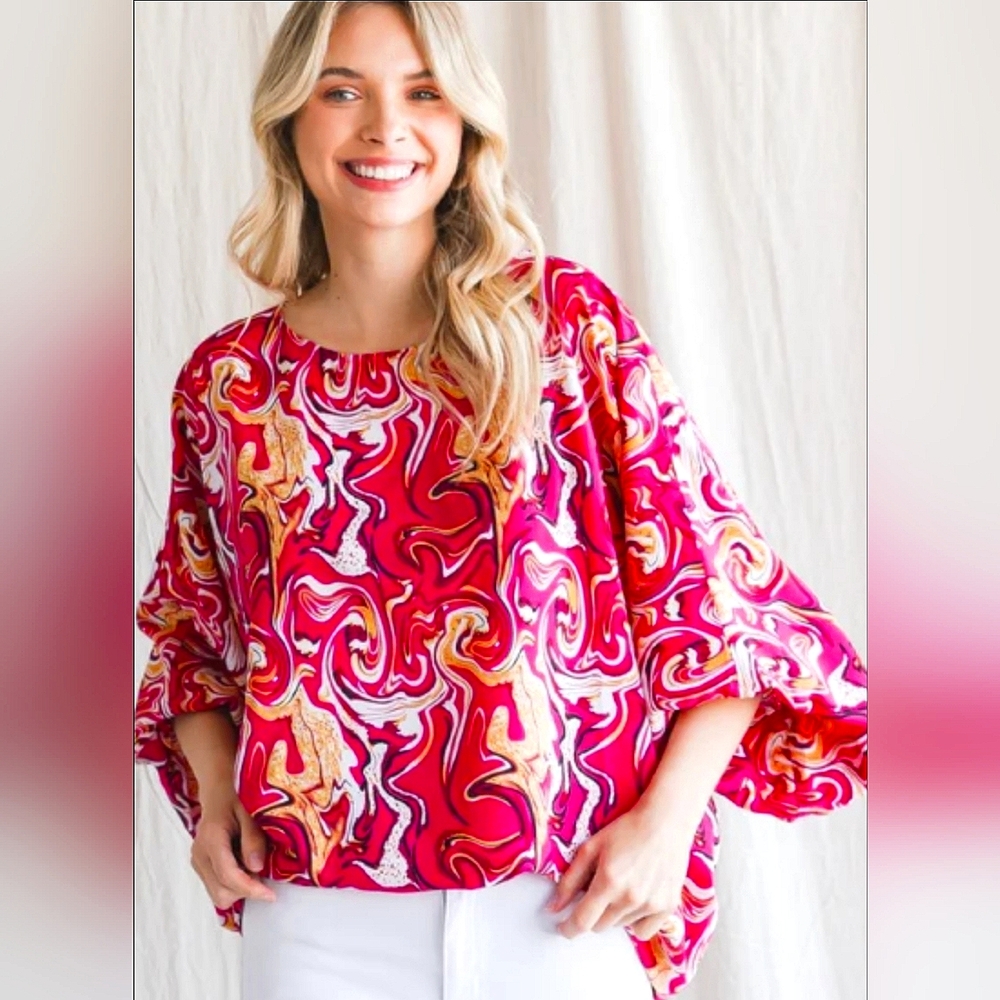 Swirled print top with smocked Ballon sleeves